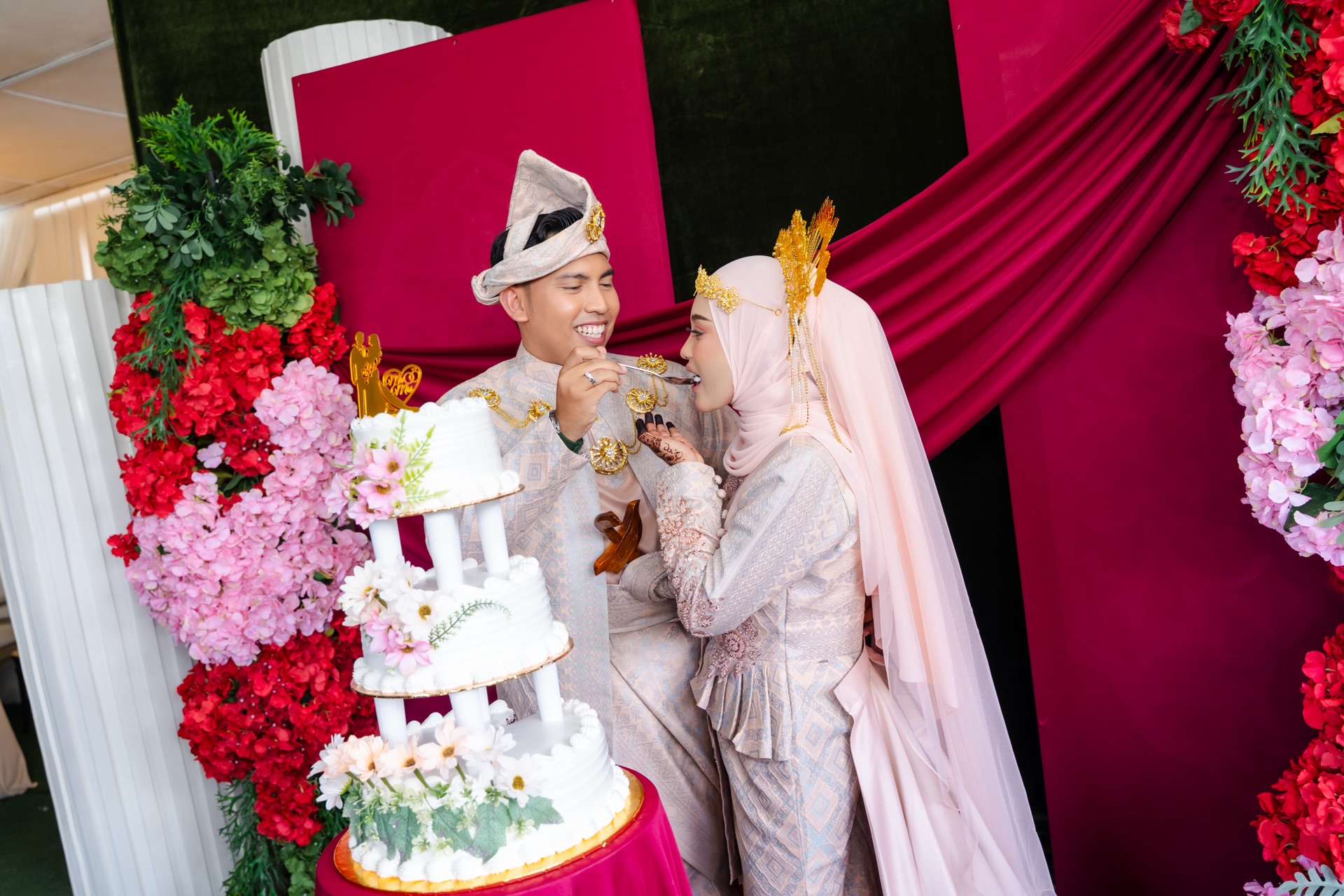 A joyful moment during the wedding cake ceremony